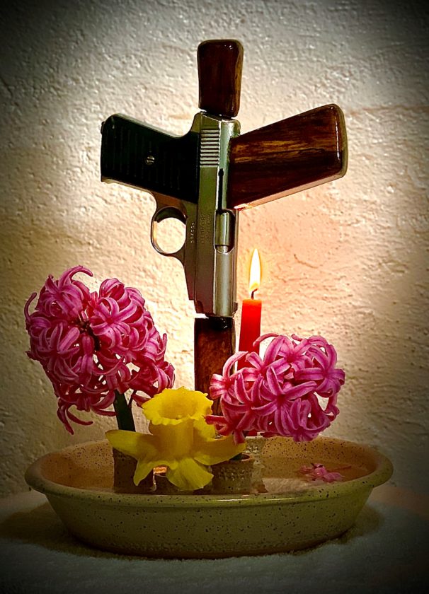 Cross made out of gun and wood. Artwork and photo by Tarris D. Rosell